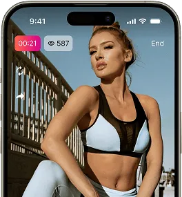 A woman in athletic wear poses outdoors during a live video stream. The timer reads 21 seconds and 587 viewers are watching.