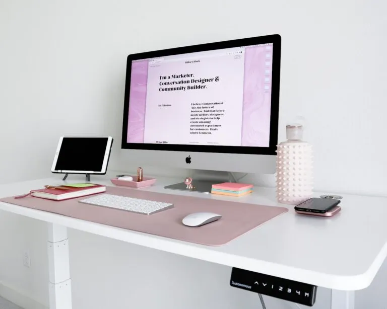 A modern fundraising website open on a laptop in a bright workspace, showing a branded donation platform for nonprofits.