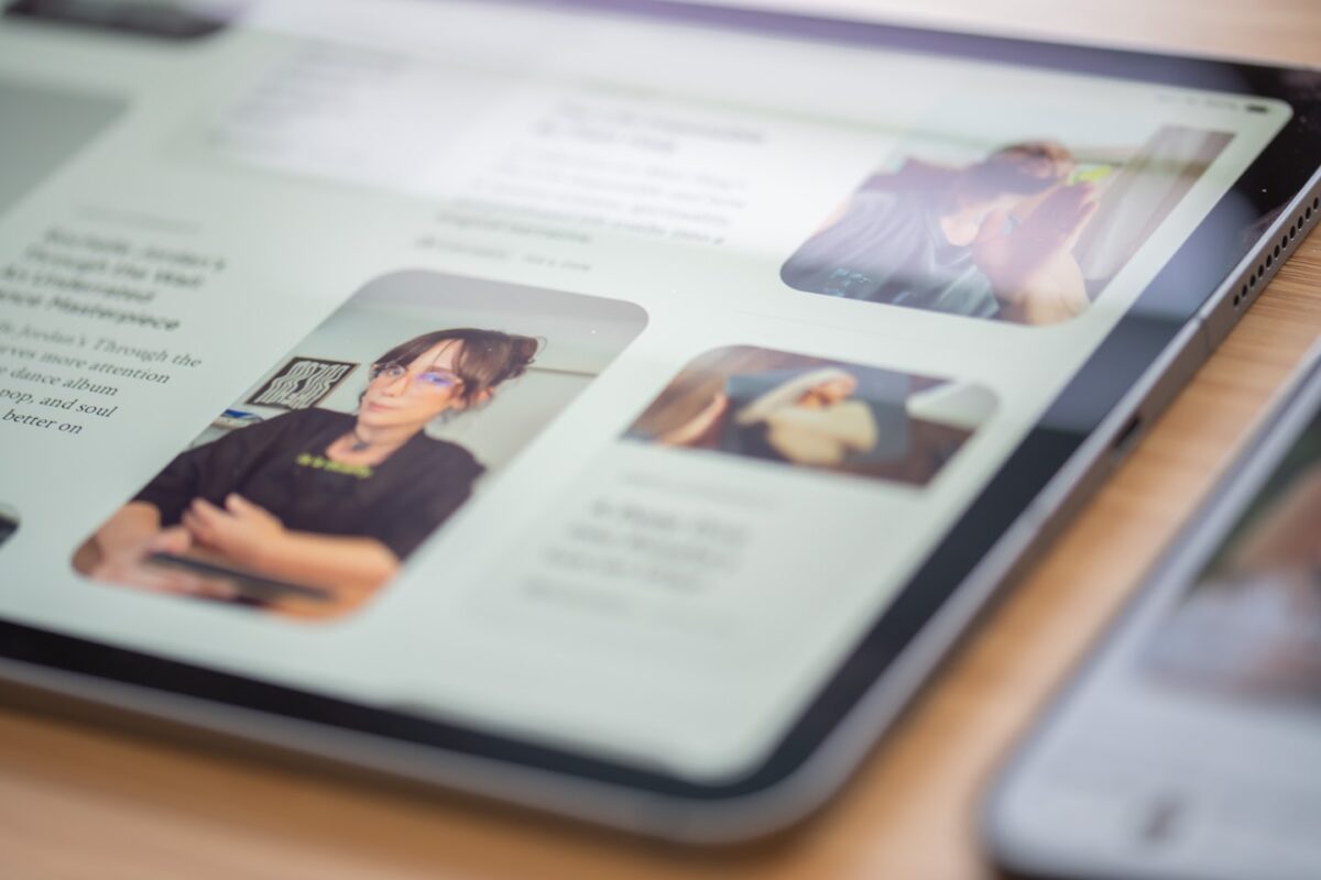 Laptop displaying a website builder interface for creating an author website